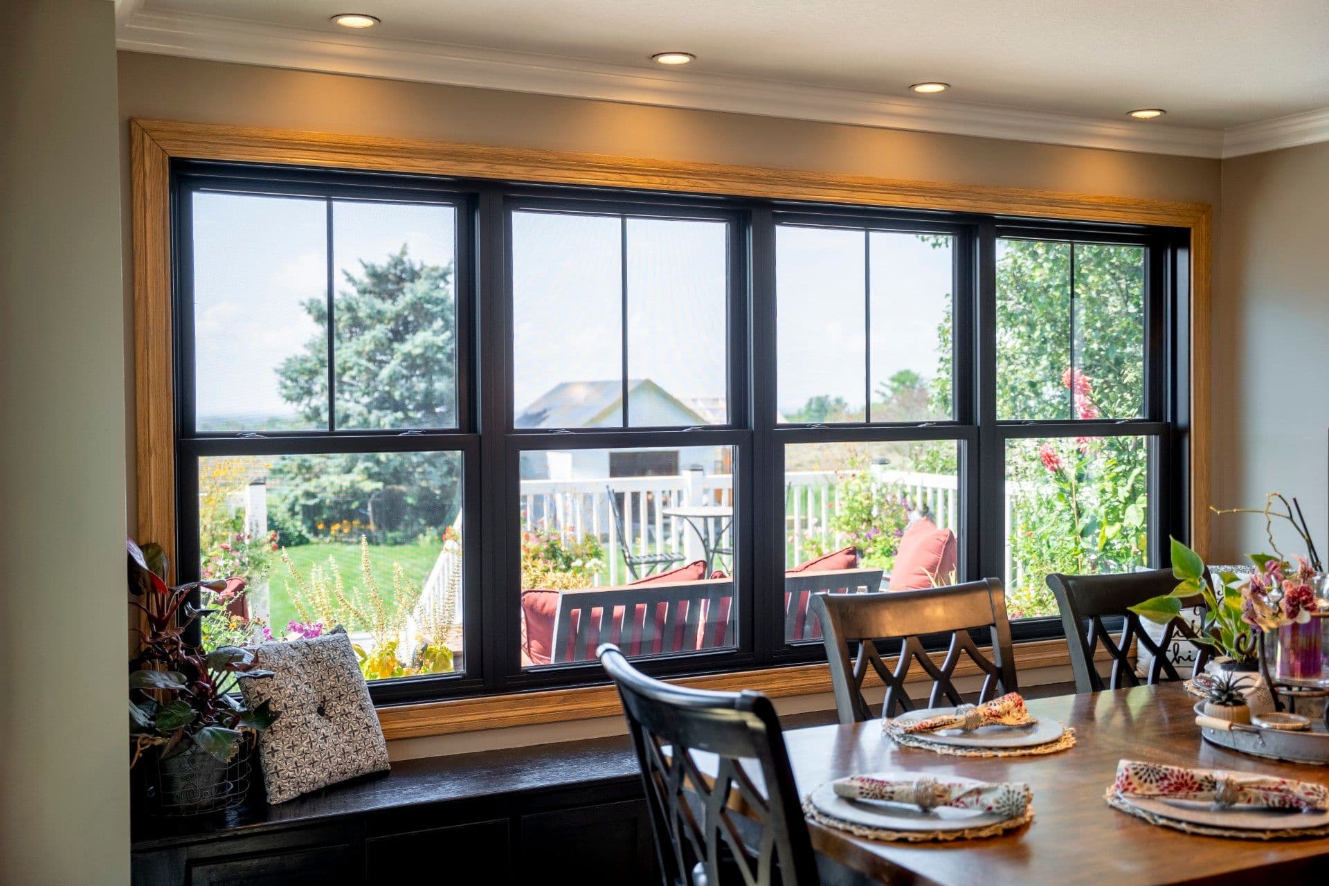 Endure mulled double hung textured matte coal black windows in an internal grid