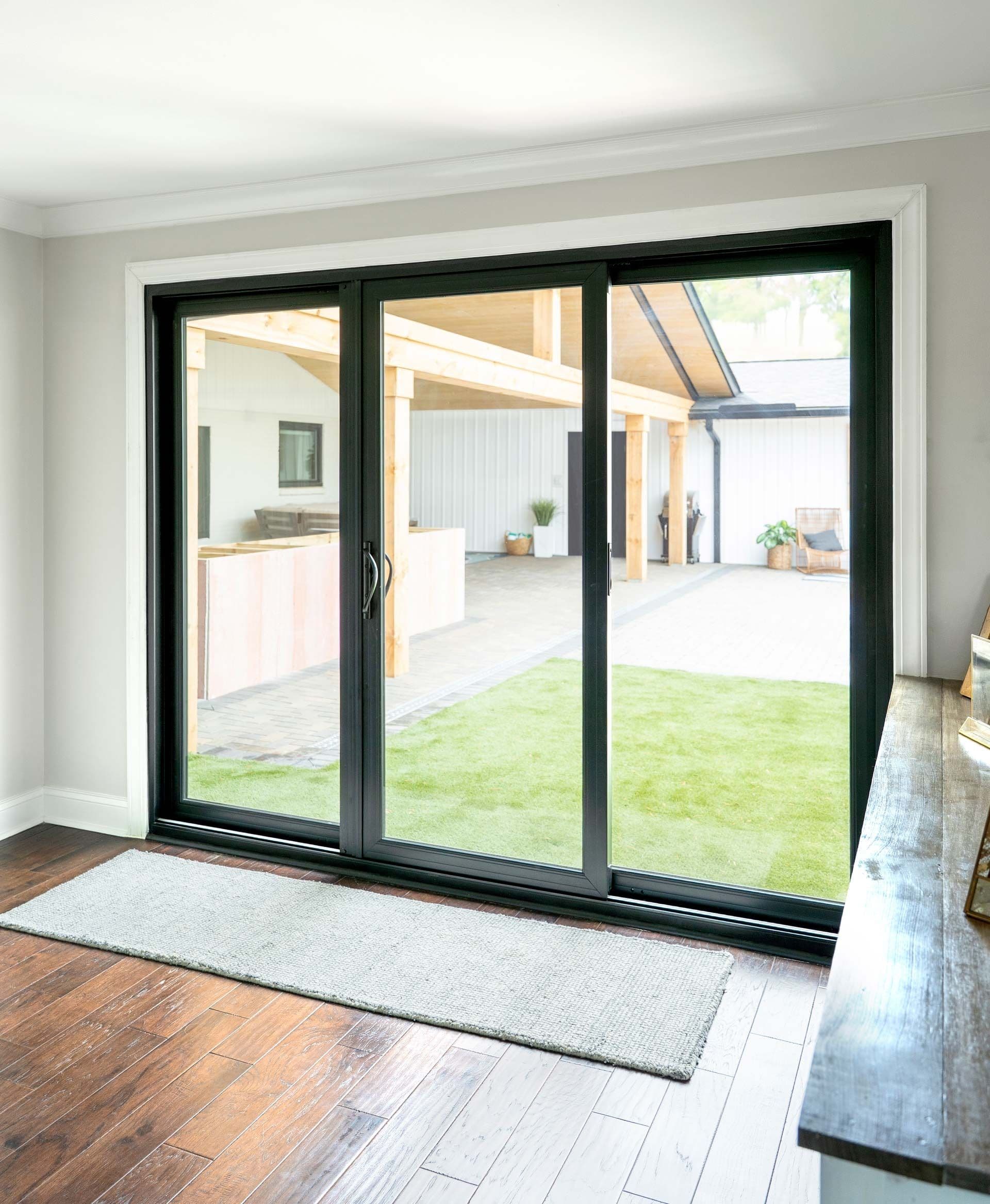 Sliding glass patio door in textured matte coal black